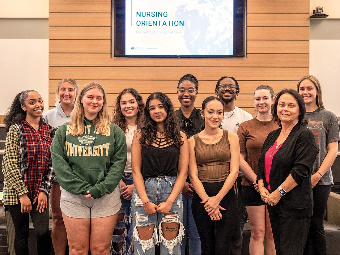 Dr. Deb Peterson (front right), chair of Saint Leo University’s Nursing Program, at orientation of the inaugural class of juniors pursuing a bachelor's degree in nursing.