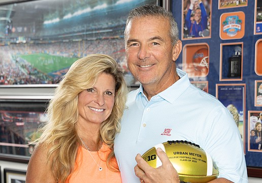 Hall of fame coach Urban Meyer gets back to work in his new community