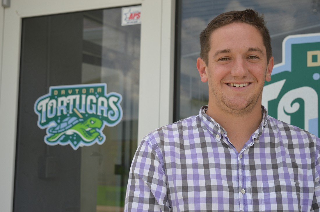 Ryan Keur poses for a photo at the Daytona Tortugas office in downtown Daytona Beach.