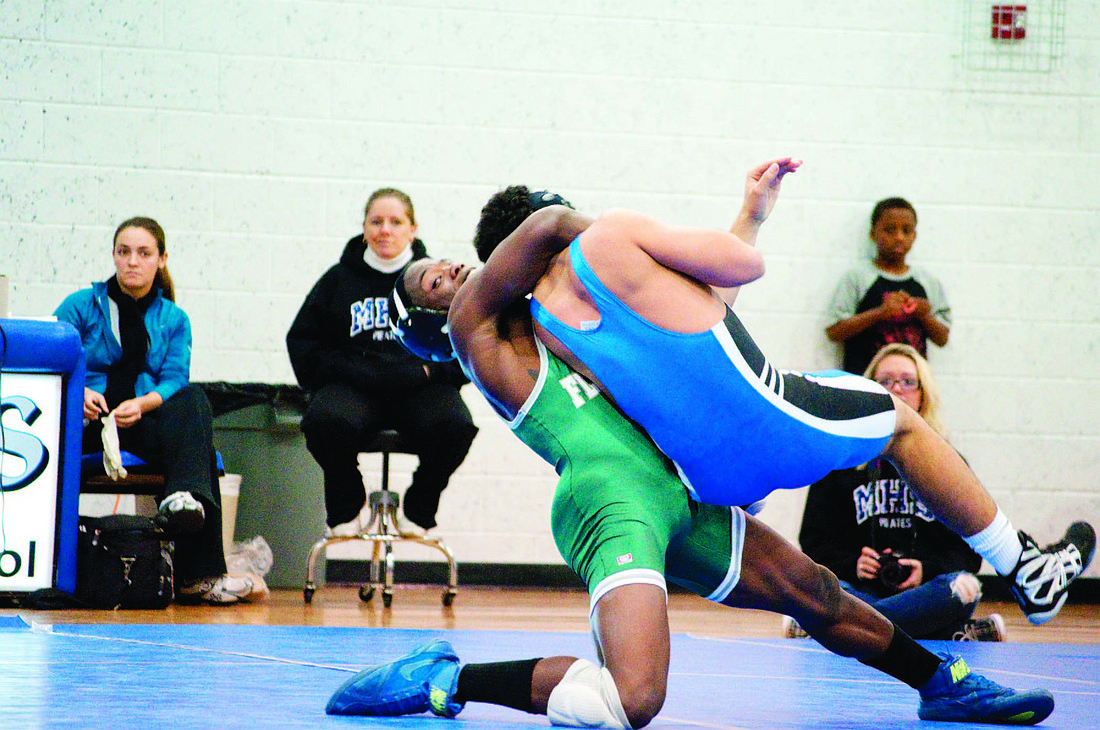 Senior 135-pounder J.Z. Williams pinned his opponent in 10 seconds to remain undefeated this season. PHOTOS BY SHANNA FORTIER