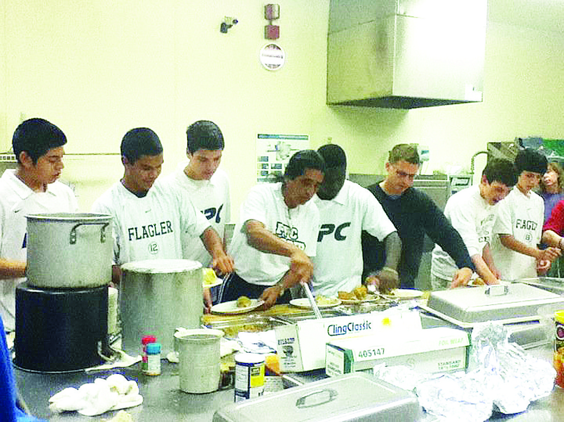 The FPC boys soccer team served 140 meals on Christmas day. COURTESY PHOTO