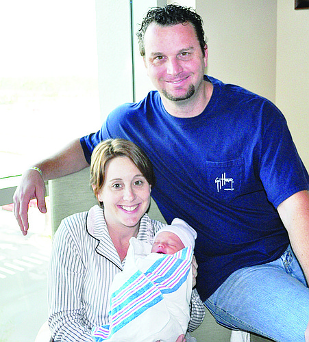 Lisa and Patrick O'Grady with baby Patrick. COURTESY PHOTO