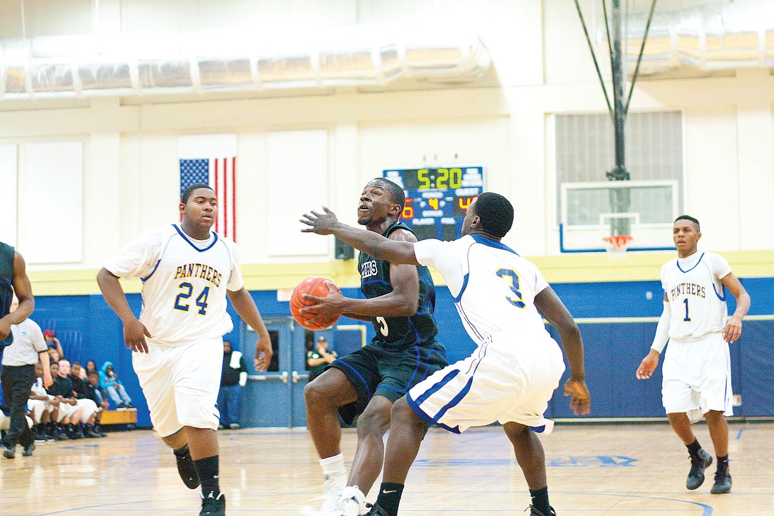 Senior Wendell Powell had 10 points in the District 4-4A championship game Saturday, Feb. 12. PHOTOS BY ANDREW O'BRIEN