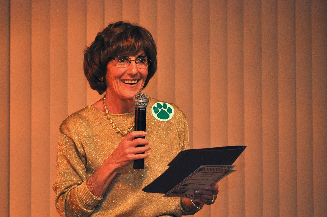 Amy Beilman, president of the board of directors, also played auctioneer at the dinner.