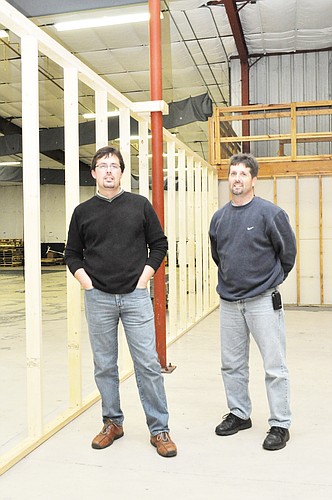 Danny and Mason Baxter hope their warehouse on Hargrove Grade will produce and export 400 QuickStands per month. PHOTO BY BRIAN MCMILLAN
