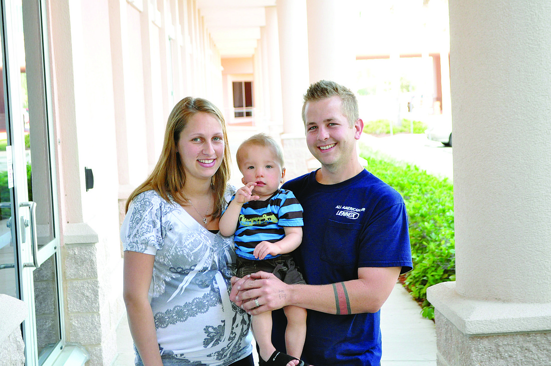 Kristina and Kevin Herndon and their 14-month-old son, Gaige