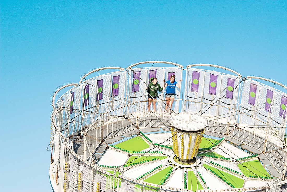 The fair includes a livestock show, art show and youth talent show, in addition to carnival rides and games.