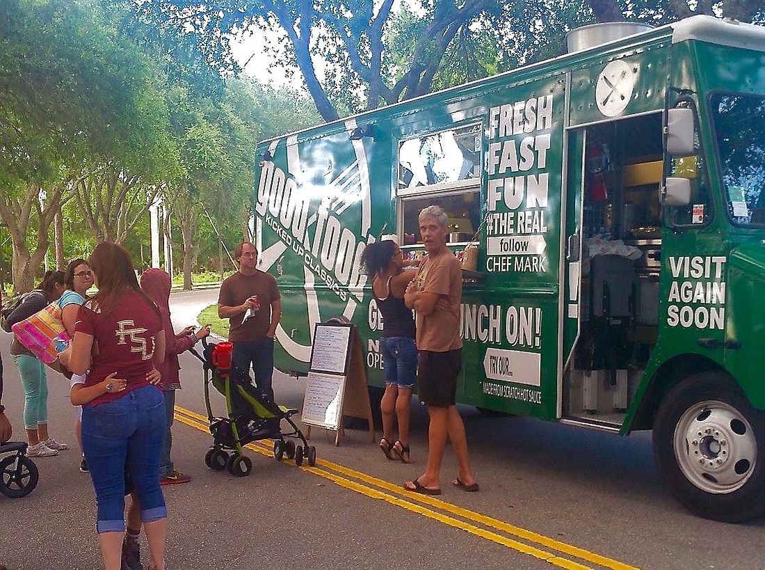 Locals wait in line at the Good Food food truck in Port Orange. Photo courtesy of the Port OrangeÂ Community Trust.