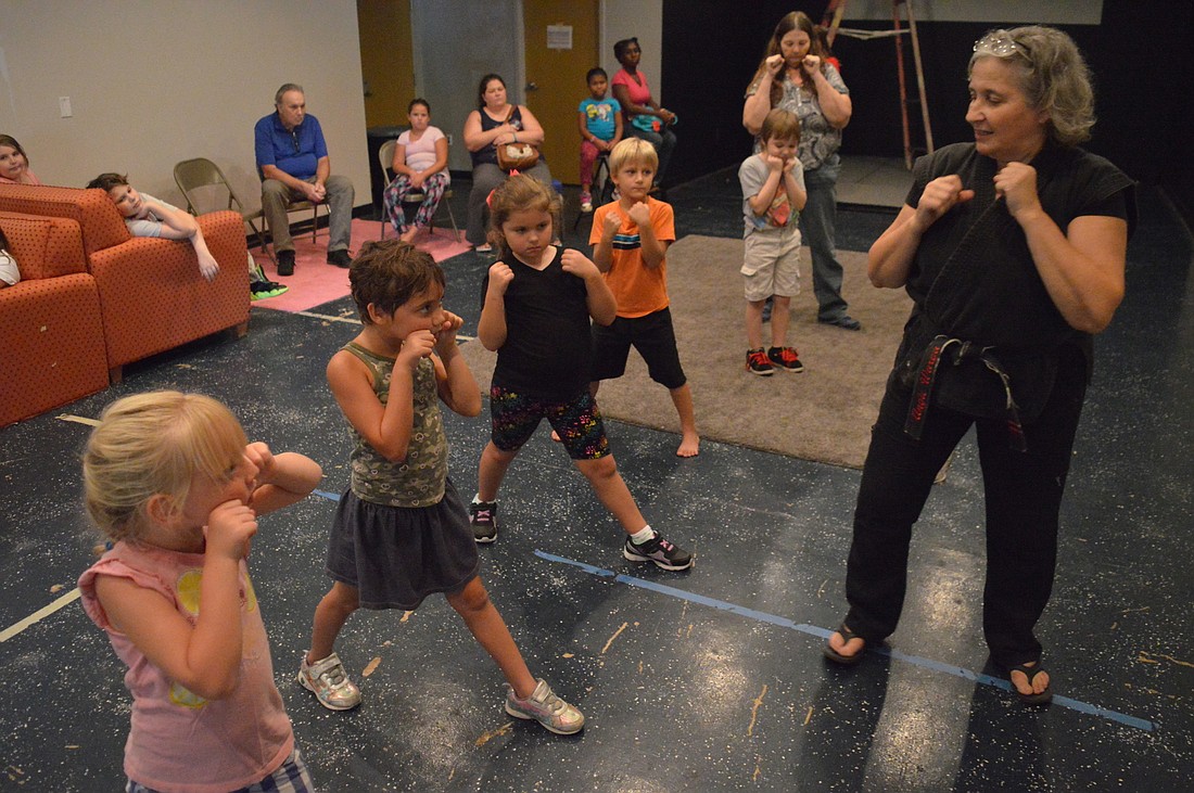 Angie Warga teaches an Our Children First martial arts class at New Life Church in Port Orange. Photo by Tim Briggs