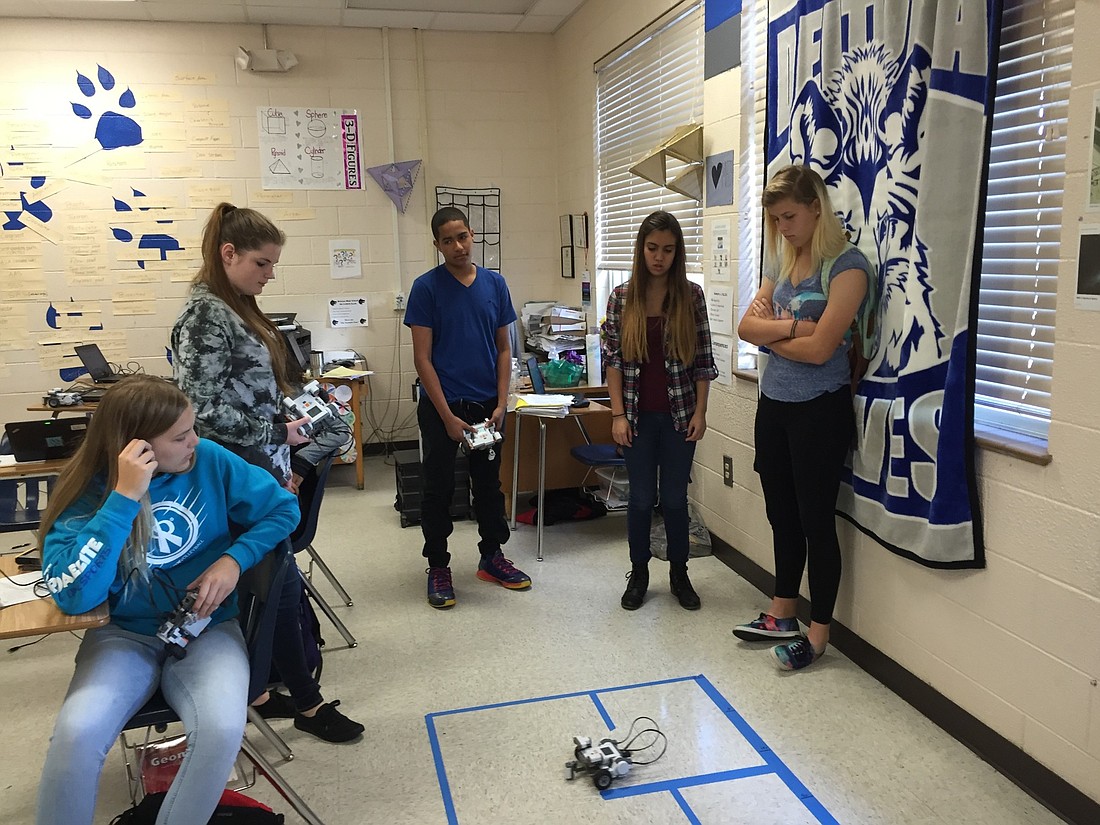 Deltona high students solving problems using robots. Photo courtesy of Volusia County Schools