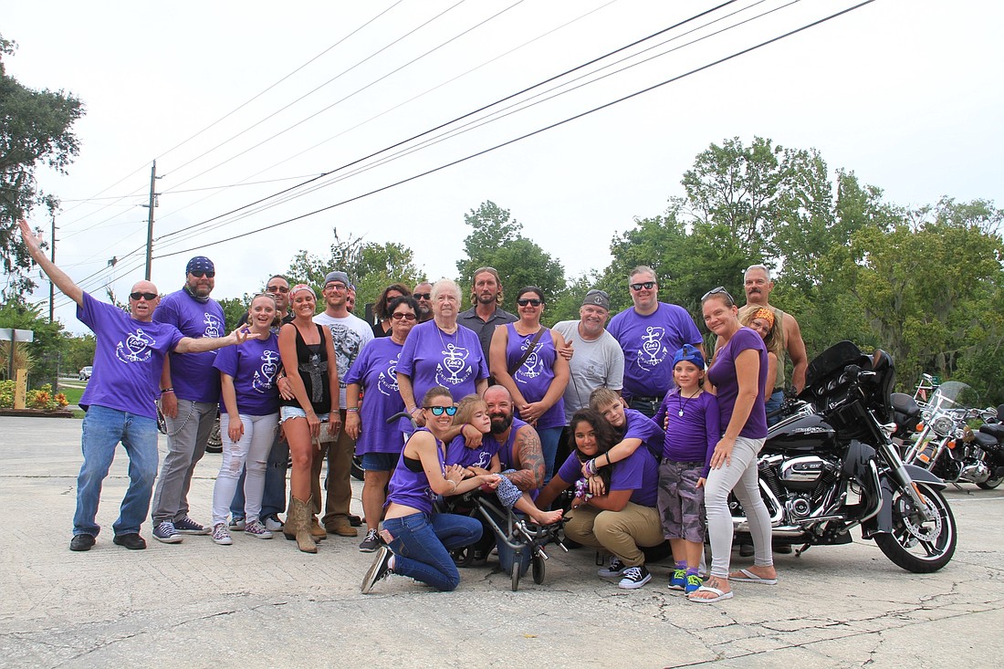 Zoe Adams' family and bikers that participated in the poker run. Photo by Nichole Osinski