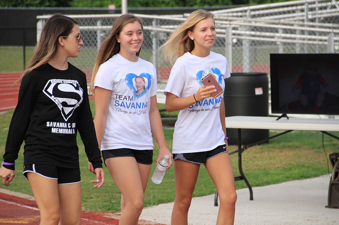 Participants walk for 13 minutes and 12 seconds around the Spruce Creek track. Photo by Nichole Osinski