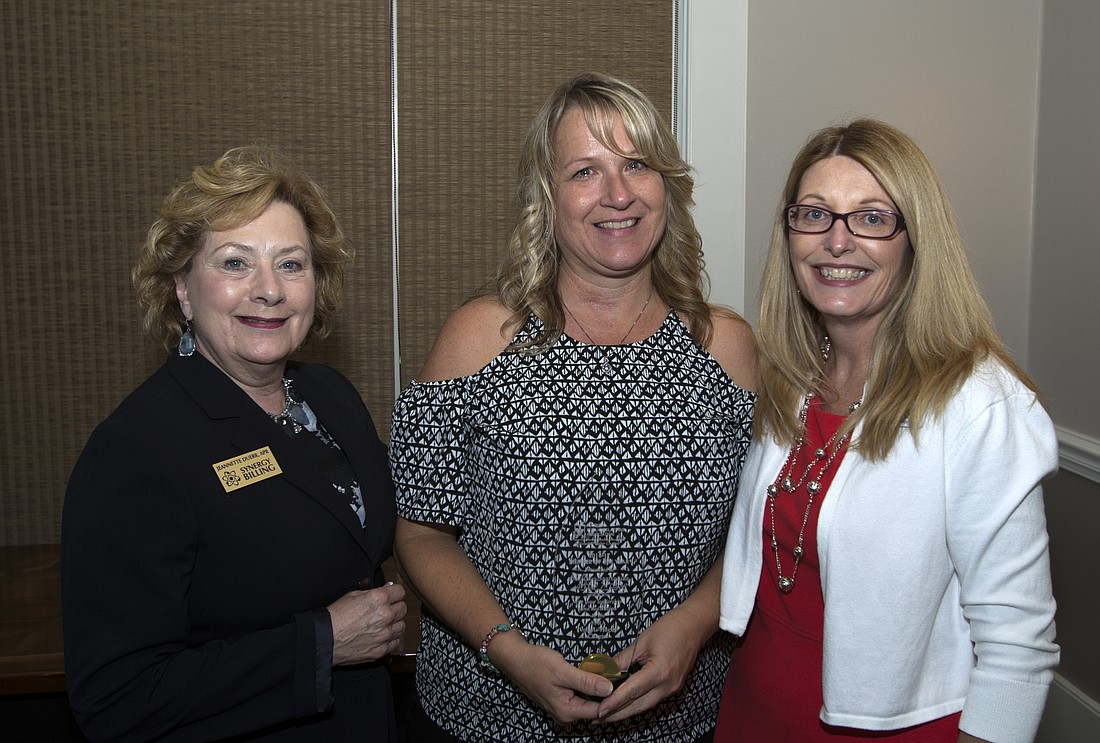 Shelley Scafraniec (center) is honored with an award of Member of the Year for Volusia-Flagler's Florida Public Relations Association. Photo courtesy of Cindi Lane