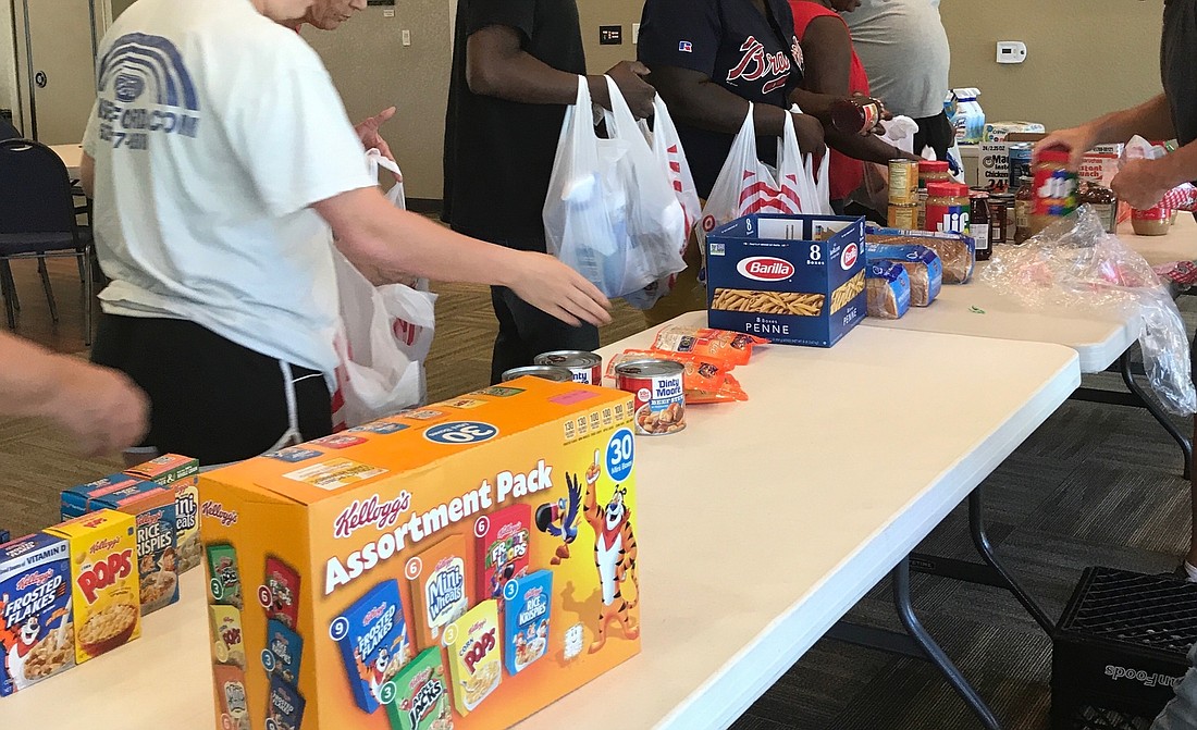 A table with items for residents affected by the hurricane. Photo courtesy of Maria Mills-Benat