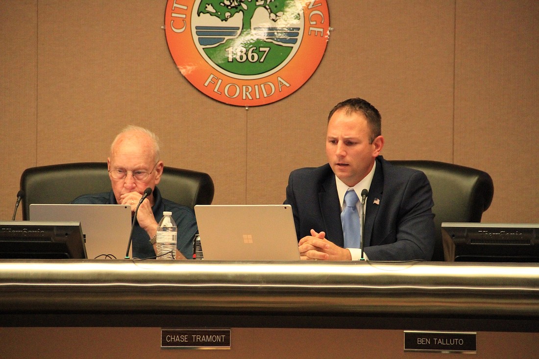 Vice Mayor Bob Ford and Councilman Chase Tramont discuss the millage rate. Photo by Nichole Osinski