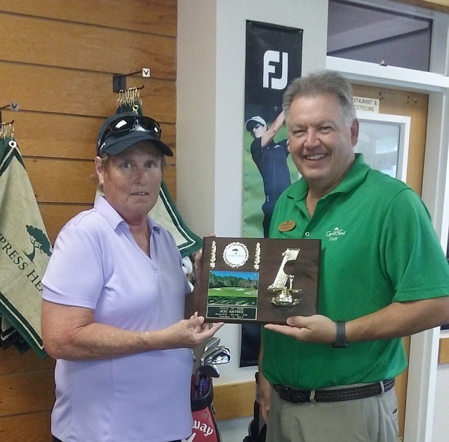 Bob Duquette, general manager, presents a plaque to Jeri Haynes. Photo courtesy of Sandi Rees