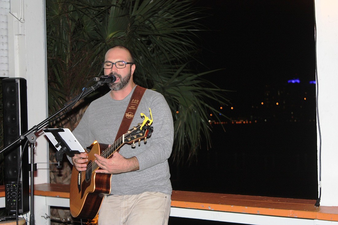 Local musician Brad Griese entertains the crowd at Sunsetters Riverfront Bar and Grill on Main Street in Daytona Beach. Photo by Wayne Grant