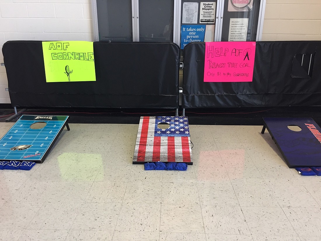 Spruce Creek High School helped raise funds for the Puerto Rico fundraiser with a cornhole booth. Photo courtesy of Christy Grusauskas, Academy of Finance