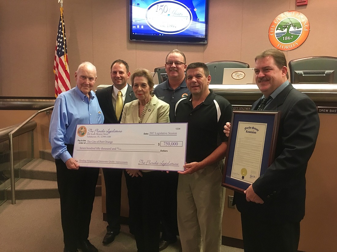 Sen. Dorothy L. Hukill presented City Council with a $750,000 check from the Florida Legislature for the drainage and stormwater project on Tuesday, Aug. 15. Photo by Nichole Osinski