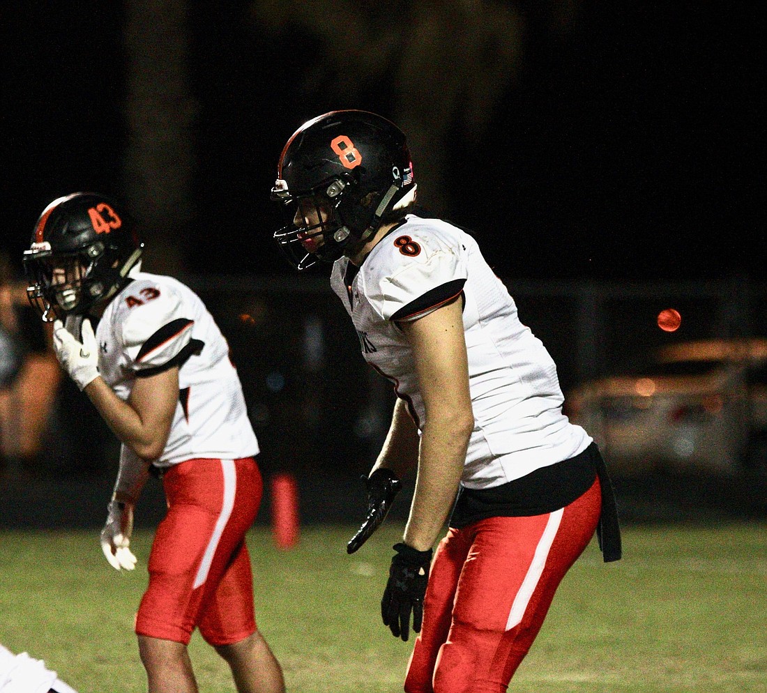 Spruce Creek linebacker Tyler Berrong  (No. 8) lines up on defense. Photo by Ray Boone
