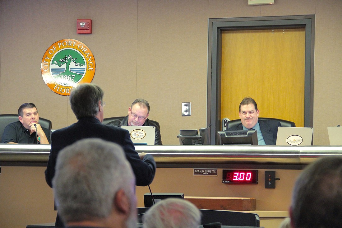 Councilman Drew Bastian, Vice Mayor Scott Stiltner and Mayor Don Burnette listen to Glenn Storch, attorney forÂ Target. Photo by Nichole Osinski