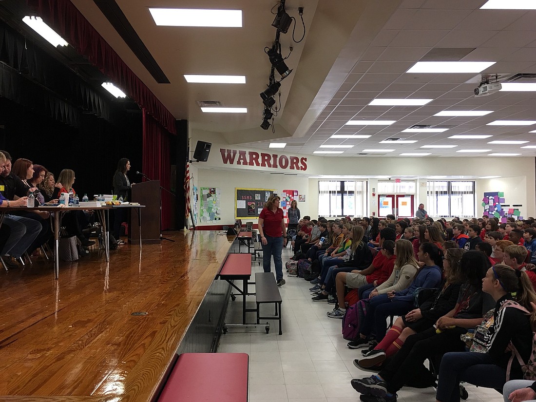 Authors speak to students at the Warrior Writers event. Photo by Nichole Osinski