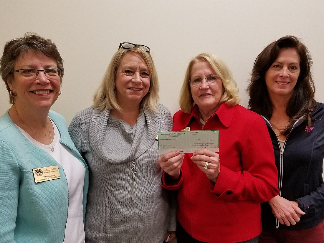 Volusia County School Board Chairman Linda Cuthbert, Volusia County Schools Chief Academic Officer Teresa Marcks, FUTURES President Paula Gregory and FUTURES President-Elect Susan Mendez. Photo courtesy of FUTURES Foundation