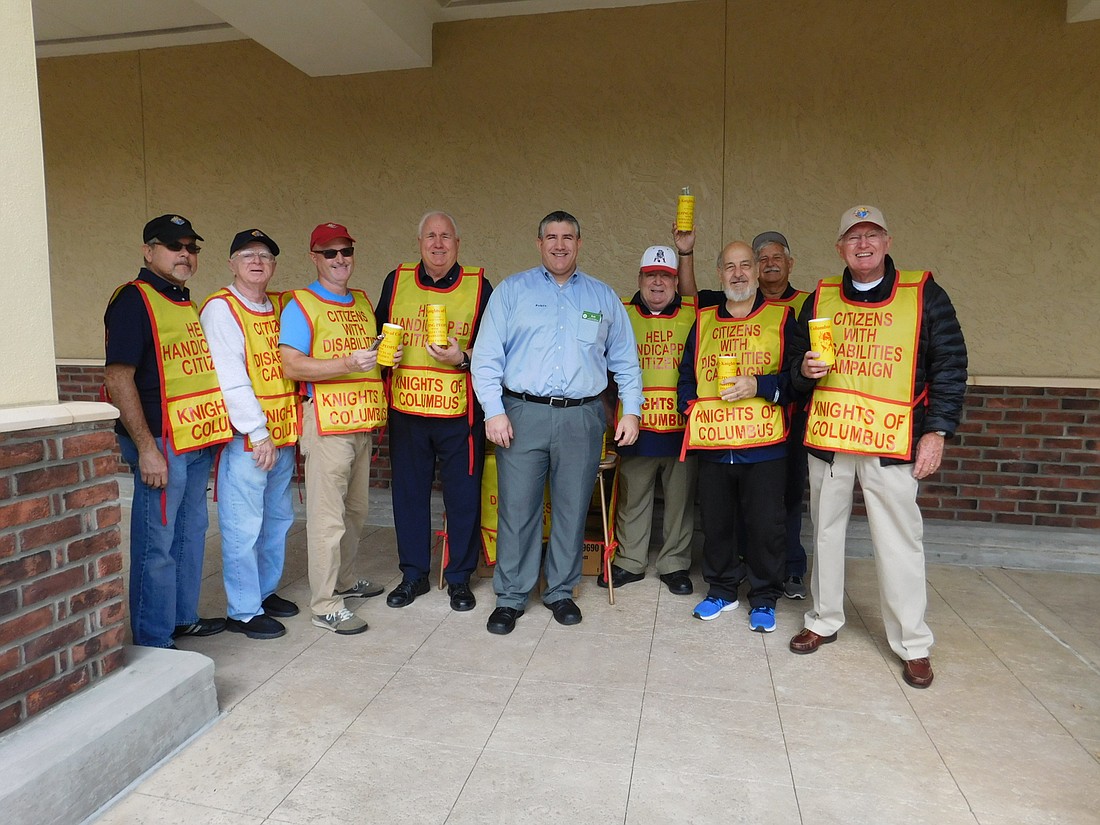 Ed Kronseder, John Ingria, program manager, Roger Packard, Tim Mell, grand knight, Bob Menello, assist manager at Publix , Al Citro, Stephen Marchese, Paul McNamara and Ray Zall. Photo courtesy of the Knights of Columbus