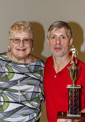 Irene Hubert presenting the George Hubert Memorial Trophy of Excellence in Soccer to athlete Kelly Caven. Photo courtesy of Anna Filannino