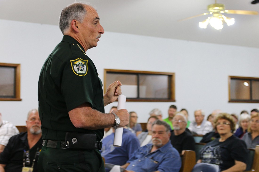 Volusia County Sheriff Mike Chitwood speaks with residents about crime. Photo by Nichole Osinski