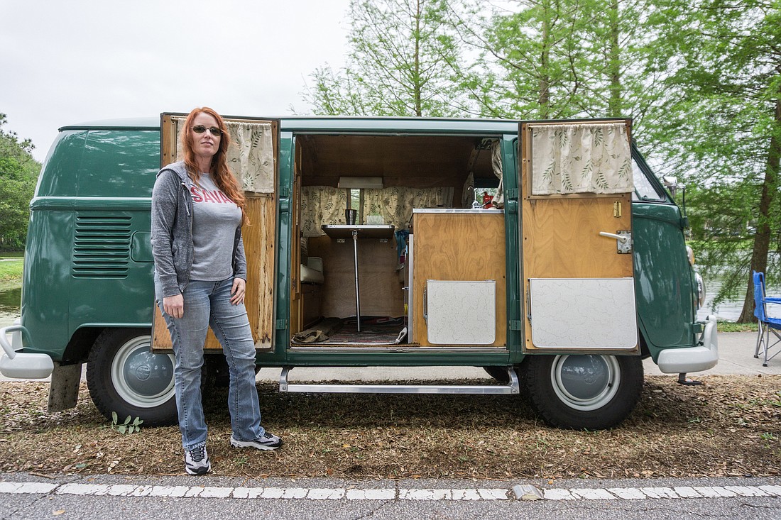 Shannon Patterson stands proudly in front of her 1967 VW Reviera