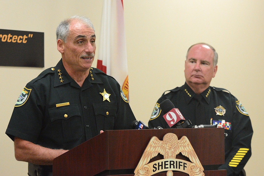 Volusia County Sheriff Mike Chitwood, left, speaks to the press at a news conference May 1. Flagler County Sheriff Rick Staly is at right. (Photo by Jonathan Simmons)
