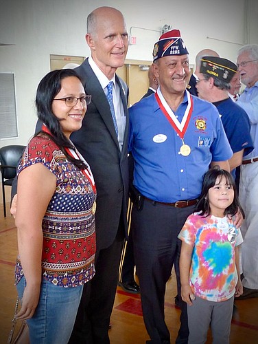 Gov. Rick Scott with Joe Rosa, his daughter, Jessica Anderson, and her daughter, Trinity Anderson. Photo courtesy of Joe Rosa.