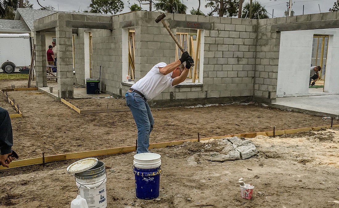 A man works outside a home being constructed in Port Orange. Photo courtesy of Allstate