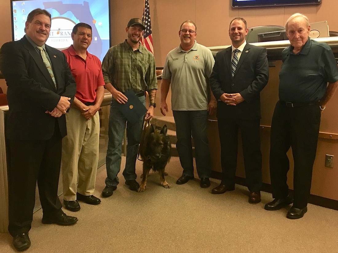 Mayor Don Burnette, Councilman Drew Bastian, Aaron Tucker and Falco, Vice Mayor Scott Stiltner, Councilman Chase Tramont and Councilman Bob Ford. Photo by Nichole Osinski