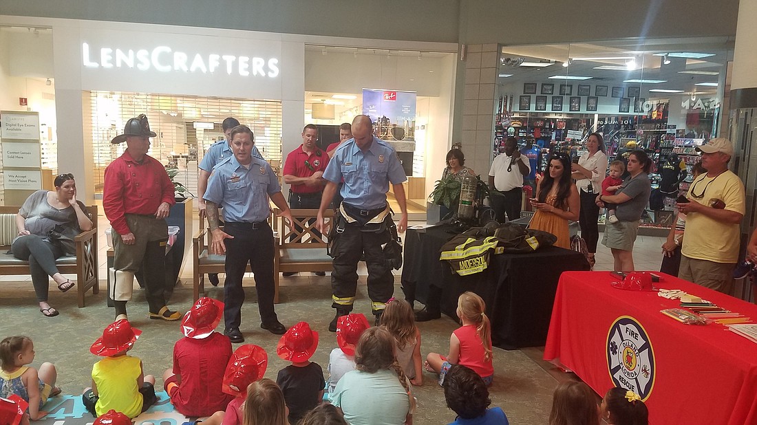 Firefighters teach children about fire safety at the Volusia Mall. Photo courtesy of Kristina Circelli, marketing director for the Volusia Mall