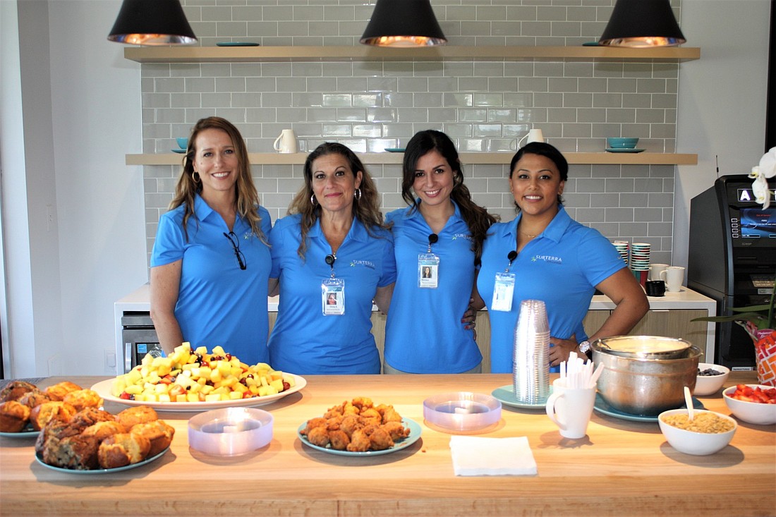 Shown in the kitchen at Surterra Wellness are Wellness Coordinators Heather Cegielski and Diana Brundage; Assistant Manager Monique Legrow; and Stephanie Soto, LPN. Photo by Wayne Grant