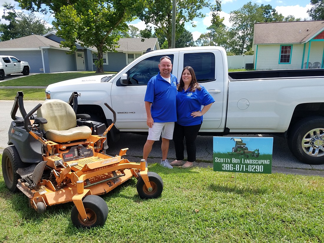 Scott Mims, left, and his wife, Stephanie, are the owners of Scotty Boy Landscaping and Maintenance, a small and local company that won the city's bid to maintain its parks and public areas. Photo by Lurvin Fernandez