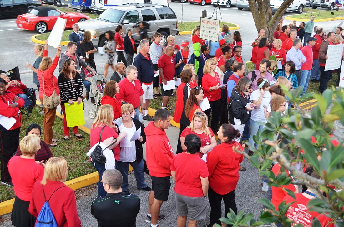 Hundreds of teachers marched to the recent School Board meeting. Photos by Wayne Grant.
