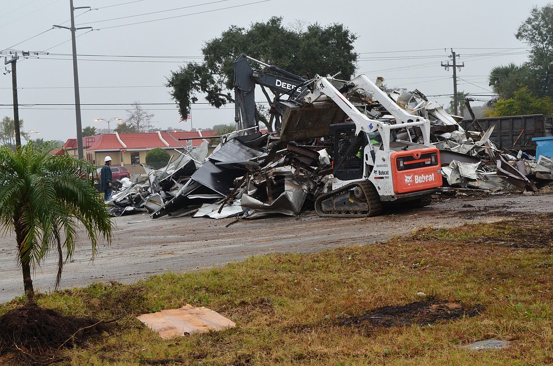 The former gas station at Nova Road and Granada Boulevard will soon be just a memory.