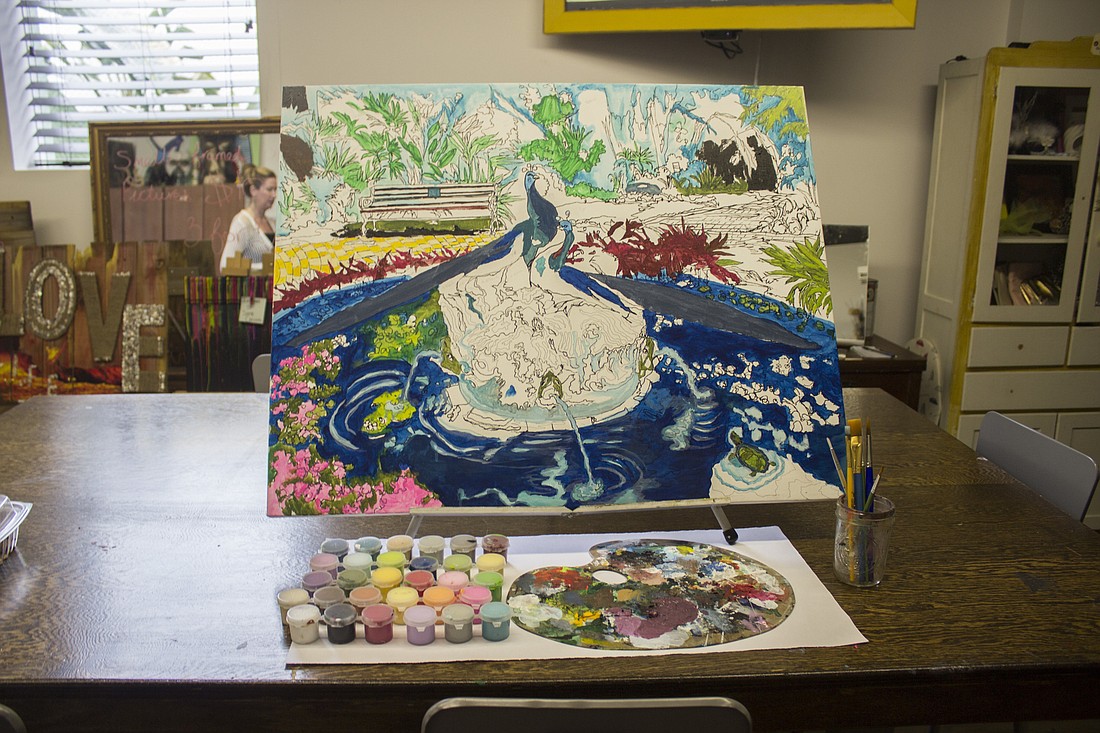 The current status of the collaborative community painting (photo by Emily Blackwood).