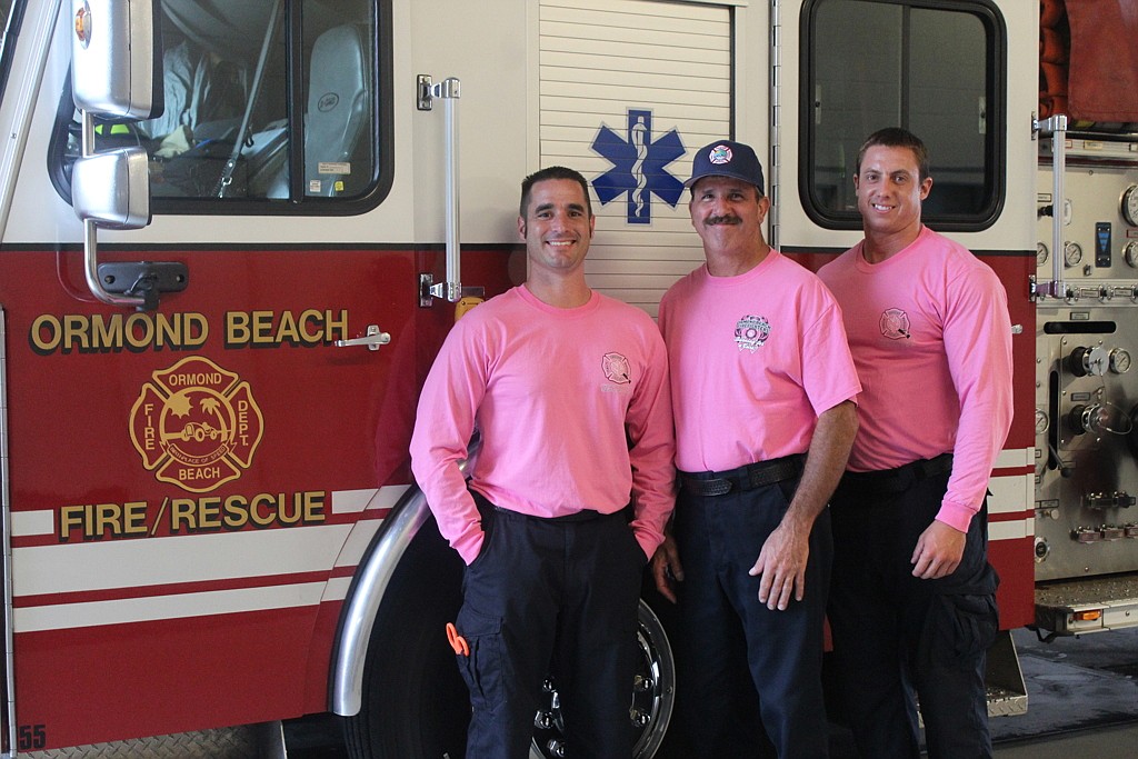 Firefighters dress pretty in pink for breast cancer awareness