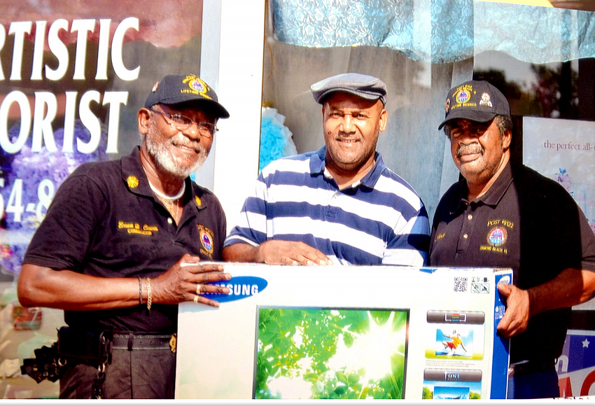 AmVets of Ormond Beach deliver flatscreen TV to prize winner Observer