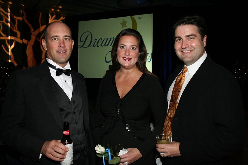 Kelly Caldwell with Allison and Tom Luzier