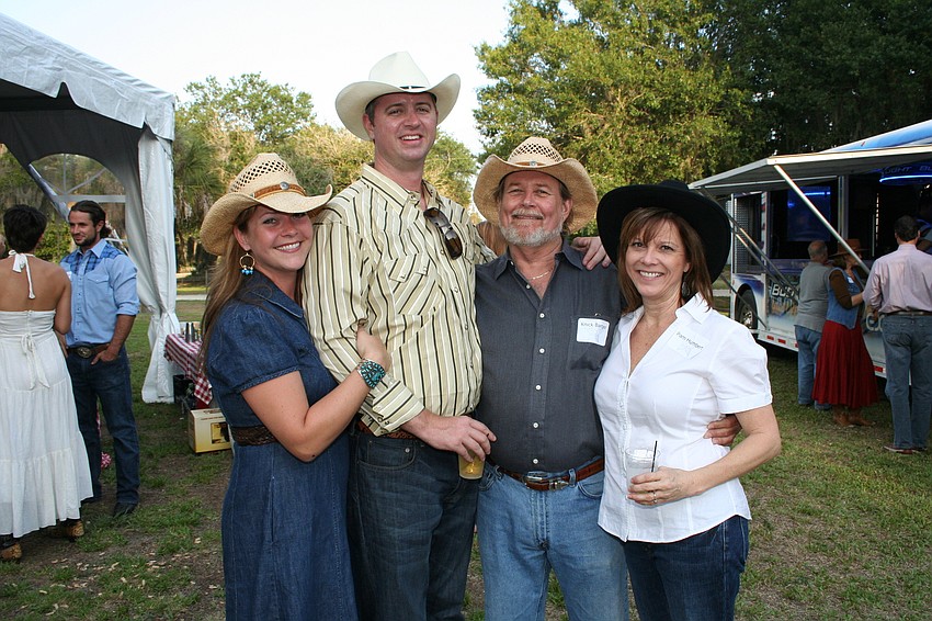Knickole and Kevin Curtis, Knick Barger and Pam Humbert at SPARCC's Hoe Down at Hi Hat Ranch in May.
