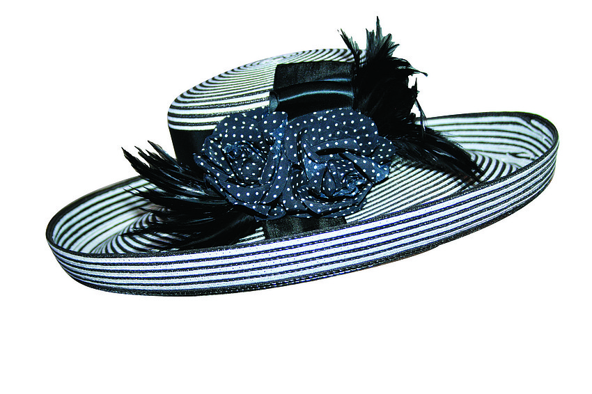 FLEUR DE PARIS HAT
'This was made for me in New Orleans. I love anything that is individual and different. I feel confident wearing this hat.'