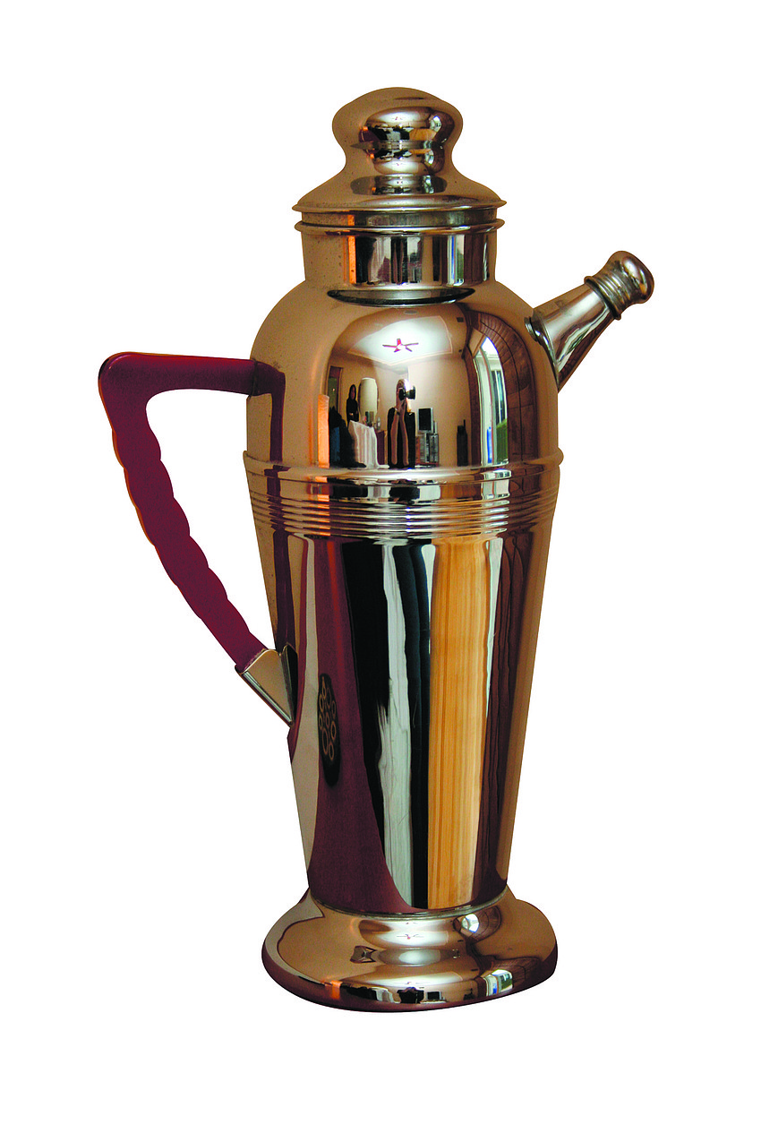 VINTAGE COCKTAIL SHAKER 
'My mother got this for my birthday - it's a 1940s cocktail shaker with a Bakelite handle. It makes me feel so glamorous, even just pouring iced tea.