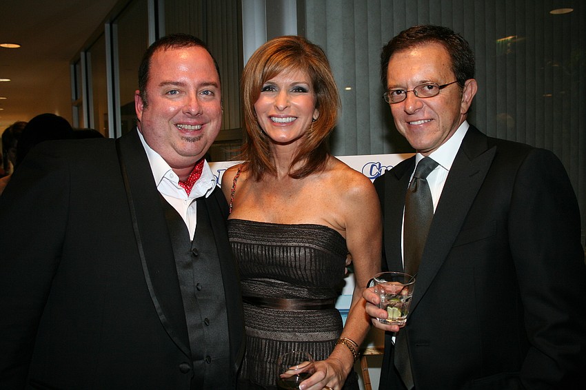 Terry McKee with Susan and Dr. Russell Samson