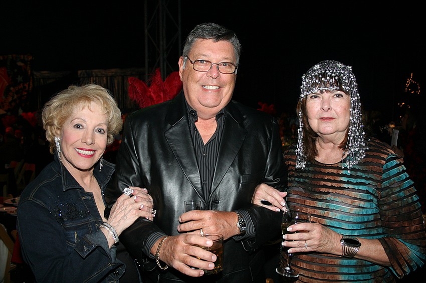 Lee Peterson, Dr. Bob Woelfel and Pat Johnson