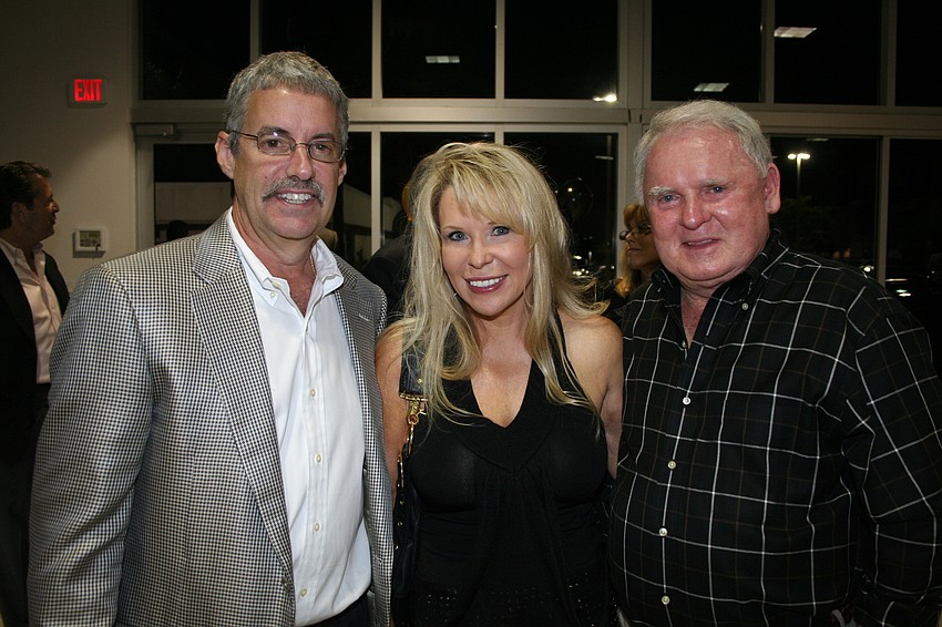 Tom Sidgmore with Sania and Rob Allen